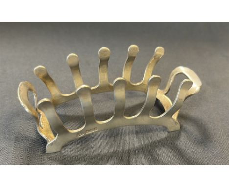GEORGE VI STERLING SILVER TOAST RACK by Adie Brothers Ltd, hallmarked Birmingham 1939. 11cm long, standing 4.5cm high.  Weigh