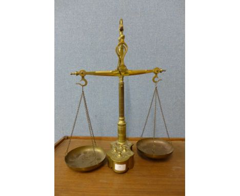 A set of brass scales and weights