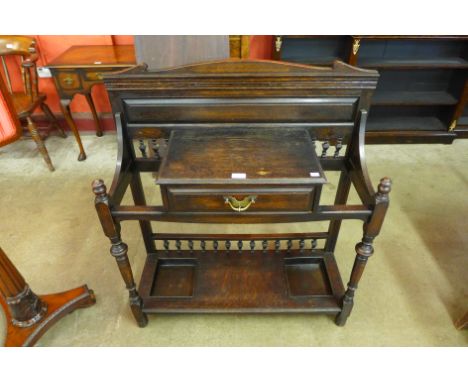 A Victorian oak stick stand