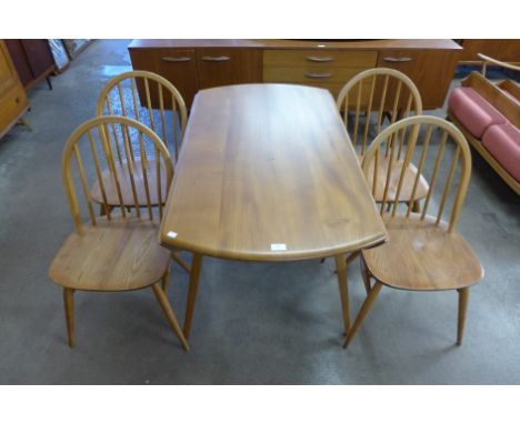 An Ercol drop-leaf table and four chairs