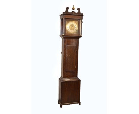 A 18th century oak longcase clock by George Voyce of Monmouth. With double swan-neck pediment, fluted columns with brass tops