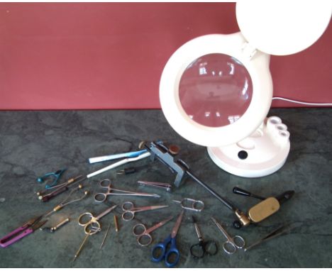 Collection of fly tying tools including Integra vice, six pairs of scissors by Veniard, mashama, Stockwell etc.