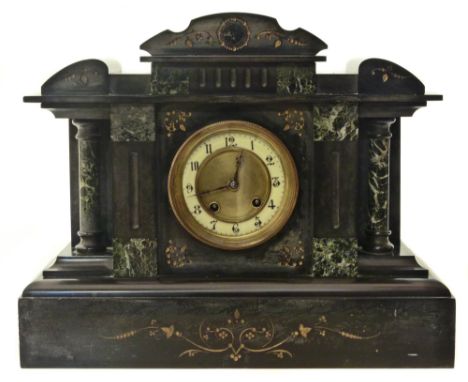 A Victorian slate mantle clock in the style of a temple with marble column detail, eight day, two train movement, striking on
