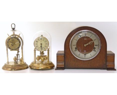Smiths Enfield mantle clock and two other clocks under domes Unfortunately we are not doing condition reports on this sale.