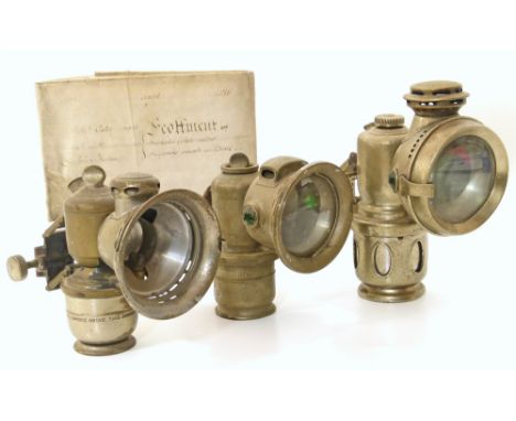 Three carbide lamps, Lucas Aceta and Powell & Hammer and the title deeds Unfortunately we are not doing condition reports on 
