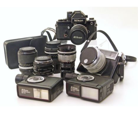 Nikon camera with micro Nikkor 55mm 1.28 lens, Also 135mm, 86mm, 35mm lens flash, also a Yashica IC Lynx-14E Unfortunately we