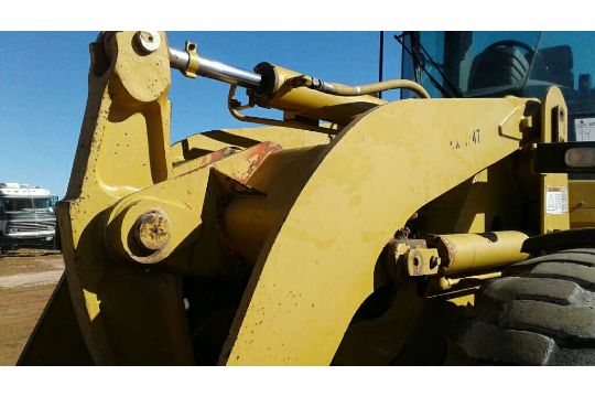 1998 Cat 928G Wheel Loader. Comes with bucket and forks. Shows 19975