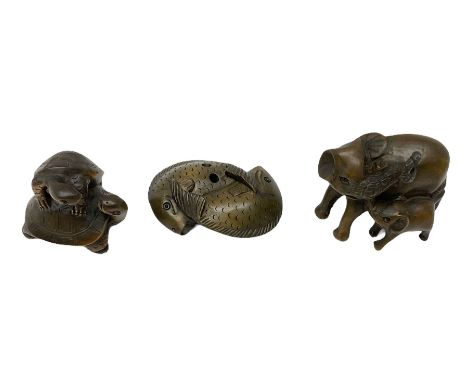 Three netsuke, modelled as a pair of fish, elephant mother &amp; child and turtle mother &amp; child
