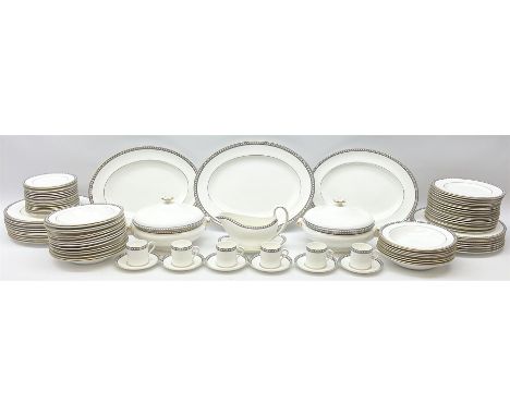 Wedgwood tea and dinner wares decorated in the Black Ulander pattern, comprising nineteen dinner plates, eighteen salad plate