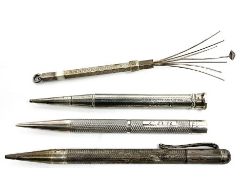 Three silver propelling pencils, each with engine turned decoration, two examples hallmarked Birmingham 1957, the other marke