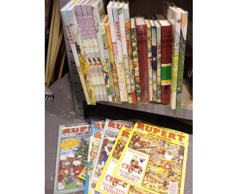 Twenty Rupert annuals and seven magazines. P&amp;P Group 3 (£25+VAT for the first lot and £5+VAT for subsequent lots) 