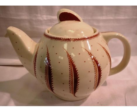 Susie Cooper design Wedgwood teapot in the pink fern pattern, H: 12 cm, no cracks or chips. P&amp;P Group 2 (£18+VAT for the 