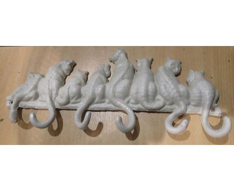 Cast iron cat tail key/coat hook, L: 30 cm. P&amp;P Group 1 (£14+VAT for the first lot and £1+VAT for subsequent lots) 