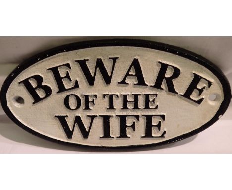 Cast iron Beware of the Wife sign, W: 17 cm. P&amp;P Group 1 (£14+VAT for the first lot and £1+VAT for subsequent lots) 