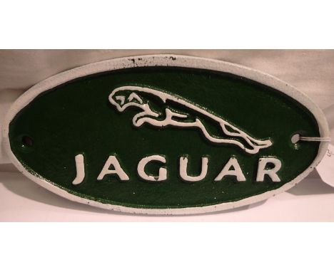 Small cast iron Jaguar plaque, W: 14 cm. P&amp;P Group 1 (£14+VAT for the first lot and £1+VAT for subsequent lots) 
