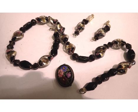 Glass beaded necklace and earring set, and a brooch. P&amp;P Group 1 (£14+VAT for the first lot and £1+VAT for subsequent lot