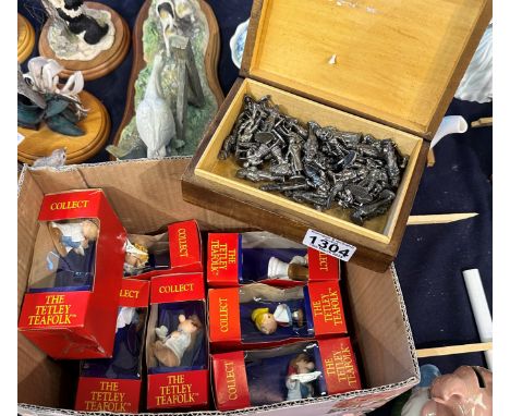 Seven Tetley Teafolk, boxed, and a quantity of pewter soldiers in a decorative wooden box. P&amp;P Group 2 (£18+VAT for the f