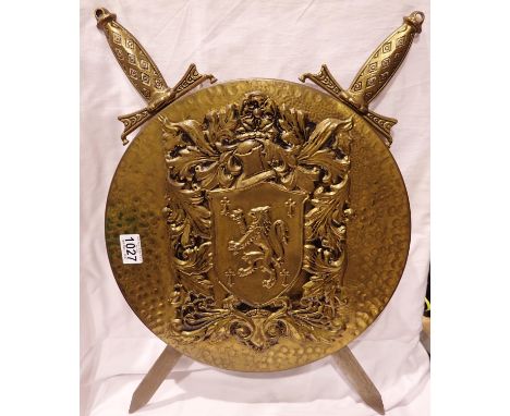 Brass wall plaque with crossed swords, overall 65 cm. P&amp;P Group 2 (£18+VAT for the first lot and £3+VAT for subsequent lo