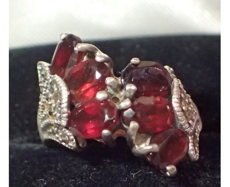 925 Silver garnet set ring, size N. P&amp;P Group 1 (£14+VAT for the first lot and £1+VAT for subsequent lots) 