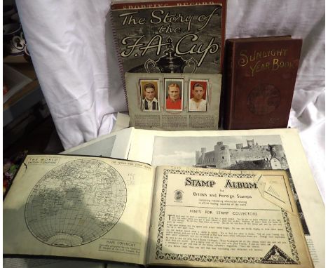 Mixed books and ephemera including a stamp album. P&amp;P Group 2 (£18+VAT for the first lot and £3+VAT for subsequent lots) 