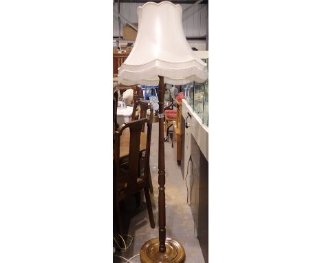 Oak stemmed standard lamp with fringed shade, overall H: 200 cm. Not available for in-house P&amp;P 