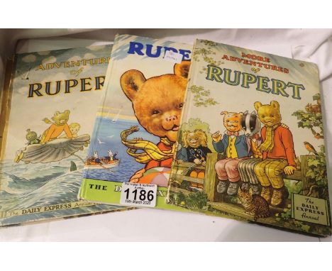 Three Rupert The Bear annuals. P&amp;P Group 1 (£14+VAT for the first lot and £1+VAT for subsequent lots) 