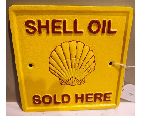 Cast iron Shell Oil Sold Here plaque, W: 15 cm. P&amp;P Group 1 (£14+VAT for the first lot and £1+VAT for subsequent lots) 