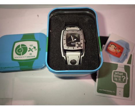 Paul Frank wristwatch, not working at lotting, with box and papers. P&amp;P Group 1 (£14+VAT for the first lot and £1+VAT for