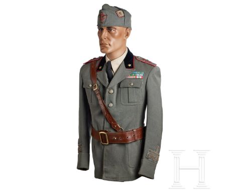 An Italian Army General Tunic and Bustina Cap  Grey-green, fine tricot cloth, open collar, four-button front, breast and wais