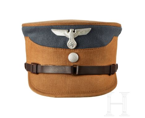 A Kepi for the SA-Group Sudetenland or Weichsel  Cap body in fine brown cloth, blue-grey wool cap band with two ventilation h