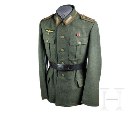 A Land-Based NCO Tunic  Field-grey wool, scalloped breast and hip pockets, five-button front, collar with double hook neck cl