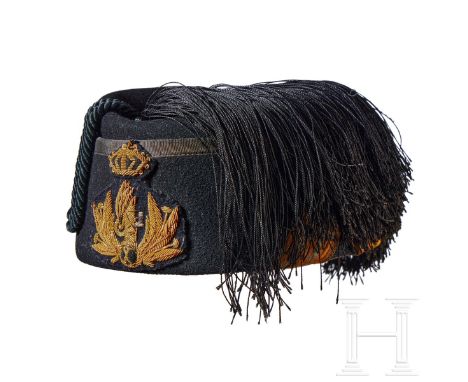 An Italian MVSN Fez  Cap body of black wool with side panel, circumference trimmed in ribbed black rayon, center crown with b