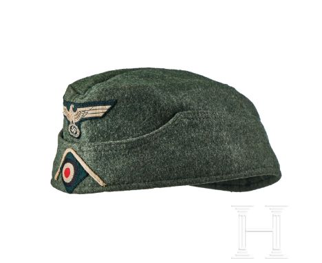 A Garrison Cap for Infantry Other Ranks  Cap body of field-grey wool, boat-shaped with scalloped lower panel, machine-woven w