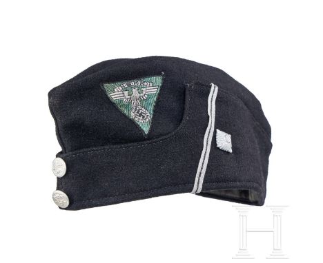 A Garrison Cap for NSKK Officers  Cap body of black wool, boat-shaped with scalloped lower panel, machine-woven silver-alumin