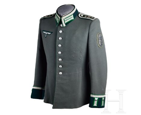 A Mountain Troops NCO Waffenrock  Field-grey very fine tricot wool, privately tailored, eight-button front, bottle-green badg