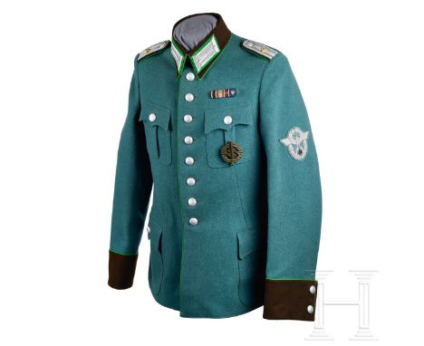 A Schupo Officer Tunic  Police-green tricot wool, privately tailored, scalloped and pleated breast and hip pockets, eight-but