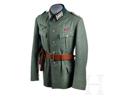 A Land-Based Officer Tunic  Field-grey wool, scalloped breast and hip pockets, five-button front, bottle green collar with do