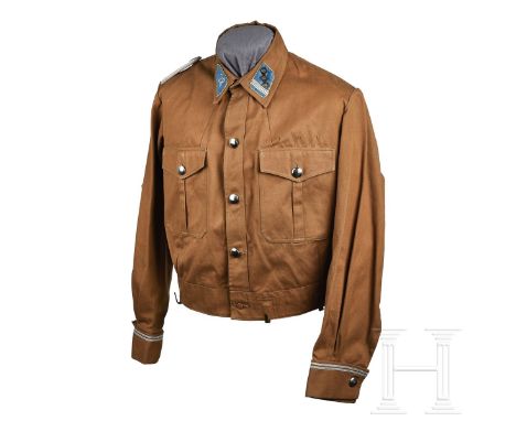 An SA-Sturmhauptführer Brownshirt  Light-brown twill cloth, five-button front, two patch pockets with scalloped flaps and ple