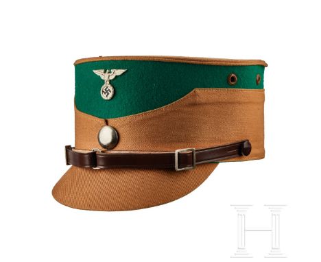 A Kepi for Sachsen Nordmark  Cap body in fine brown cloth, emerald green wool cap band with two ventilation holes on each sid