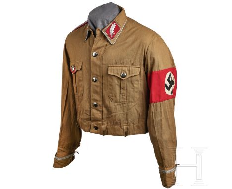 An SA-Standartenführer Brownshirt  Light-brown twill cloth, five-button front, two patch pockets with scalloped flaps and ple