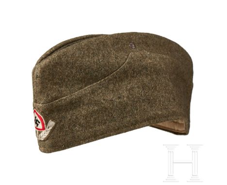 A Garrison Cap for RAD Other Ranks  Cap body of brown wool, boat-shaped with scalloped lower panel, single brown finish venti