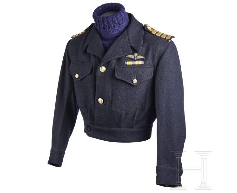A Royal Navy Fleet Air Arm Pilot Tunic   Navy-blue wool cloth tunic, two-button front closure, open collar with hidden button