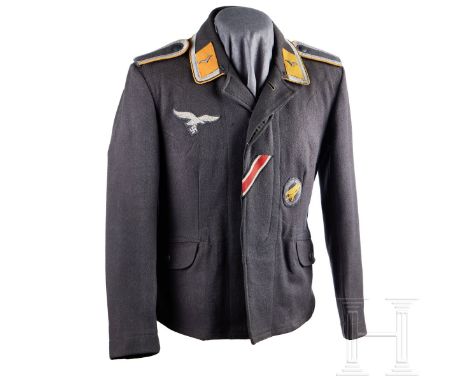 An NCO Tunic  Blue-grey wool flyers blouse, open collar, five-button front, two waist bag pockets with buttoned flaps, cuffs 