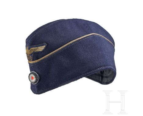 A Garrison Cap for Officers  Cap body of doeskin dark-blue wool, boat-shaped with scalloped lower panel, piped in gilt-wire m