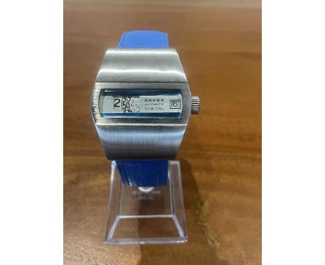 Vintage 1970s Anker Automatic Jumping Hour Watch with Blue Strap&nbsp;
&nbsp;
Powered by a reliable automatic movement, this 