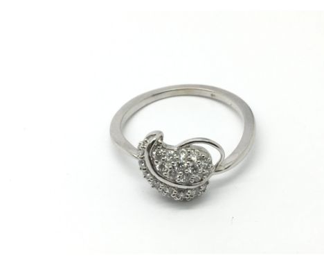 A 9ct white gold ring set with diamonds in a setting in the form of a leaf, approx.52ct, approx 2.5g and approx size P-Q.