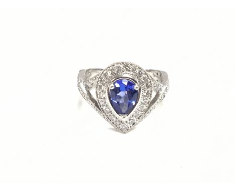 18ct white gold diamond and tanzanite ring. Size N. 0.85ct Tanzanite 0.45ct Diamond