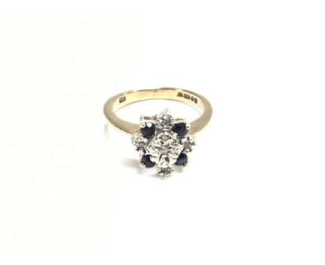 A 9ct gold stone set ring. Approximately total weight is 3.4 and size M