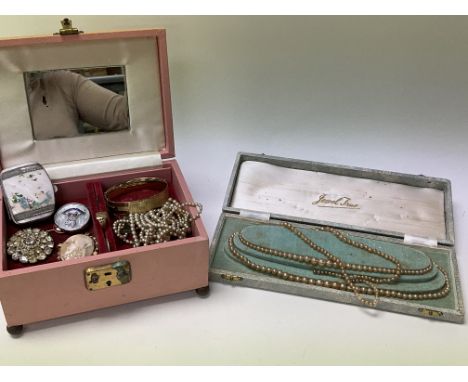 A jewellery box containing a 9ct gold ring, a gold plated bangle and cameo brooch and a collection of other costume jewellery