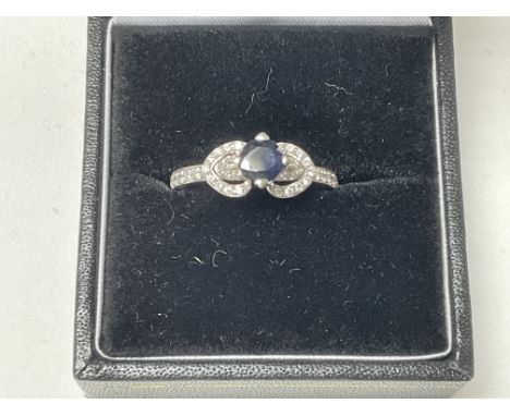 18ct black diamond and diamond ring